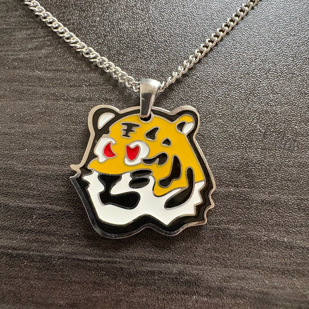 Louis Vuitton Tiger Silver Pendant Necklace with Bold Accents
